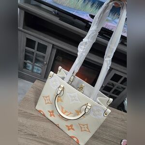 Louis Vuitton Cream and Orange Tote Bag